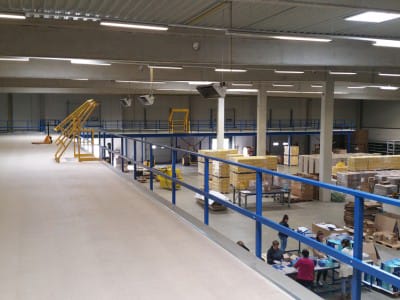 Delivery and installation of mezzanine shelving system.